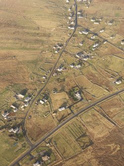 Oblique aerial view of the township of Arnol, taken from the SSW.