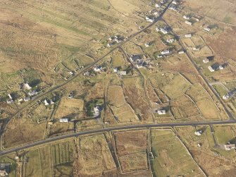 Oblique aerial view of the township of Arnol, taken from the SSE.