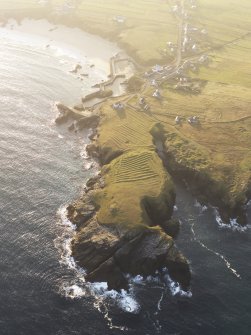 Oblique aerial view of Port of Ness, taken from the S.