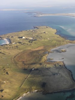 General oblique aerial view of the remains of Vallay House and Old Vallay House, Vallay, North Uist, taken from the SSW.