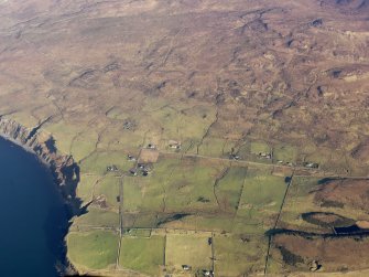 General oblique aerial view of the remains of the townships of Trumpan Mor, Trumpan Beg and the remains of the surrounding dykes and lazy beds, Waternish, Skye, taken from the SW.