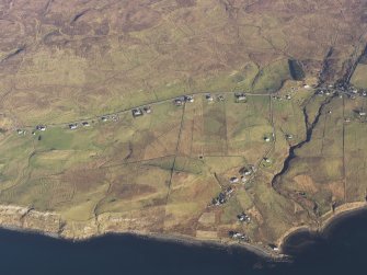 Oblique aerial view of the remains of the townships of Upper and Lower Halistra and Peinstaphen, with the remains of adjacent dykes, enclosures and lazy beds, Waternish, Skye, taken from the SW.