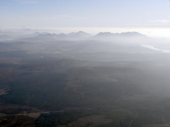 General oblique aerial view of the wind farm at Edinbane and the Waternish peninsula, looking toward the Cuillin hills, Skye, taken from the SW.