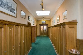 Interior.  Ground floor.  View looking along corridor linking the locker room area and the social spaces of the clubhouse.