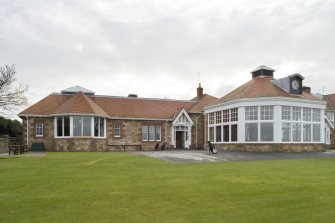 View of player's entrance, with mens locker room to left and smoking room to right, taken from the north north east.