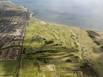 General oblique aerial view of Carnoustie Golf Courses, taken from the SW.