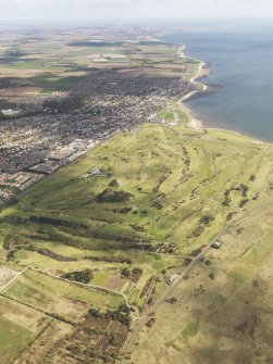 General oblique aerial view of Carnoustie Golf Courses, taken from the SSW.