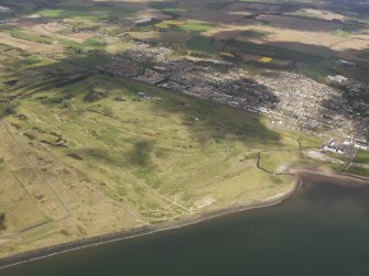 Oblique aerial view of Carnoustie Golf Courses, taken from the SSE.