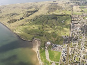 General oblique aerial view of Carnoustie Golf Courses, taken from the NE.