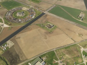 Oblique aerial view of the soilmarks of the rig and furrow at Edzell Airfield, taken from the E.