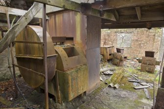 Interior. Clay Distribution area. Brick crusher. Brick would be added to the clay 'mix' to achieve the right consistency and chemical balance for fireclay bricks.