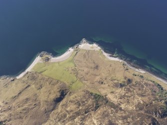 General oblique aerial view of the remains of lazy beds, field boundaries and a sheep fold at Rubha Ard Slisneach on the N coast of the Knoydart Peninsula, taken from the SE.