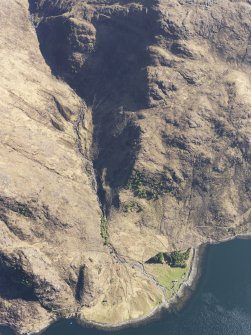 Oblique aerial view of the remains of Skiary township and head dyke, on the S side of Loch Hourn, taken from the N.
