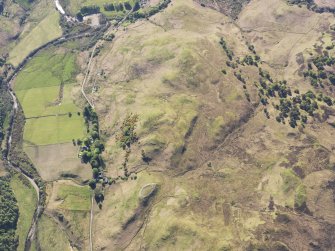 General oblique aerial view of the remains of Am Baghan Burblach fort and the old military road in Glen More, E of Glenelg, taken from the ENE.