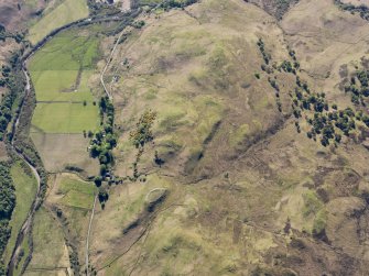 General oblique aerial view of the remains of Am Baghan Burblach fort and the old military road in Glen More, E of Glenelg, taken from the ENE.