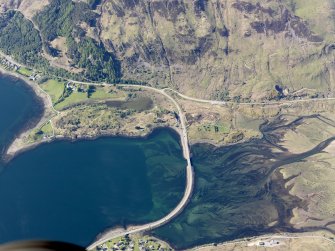 General oblique aerial view of the remains of Duncan Diarmid Dun and the head of Loch Duich at the Clachan Duich Bridge and causeway, taken from the SSE.