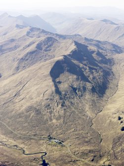 General oblique aerial view of the remains of the old military road along Glen Shiel, Cluanie Inn and the mountains of Kintail, taken from the SE.