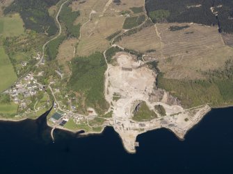 General oblique aerial view of Furnace village  with the granite quarry adjacent, taken from the SSE.