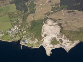 General oblique aerial view of Furnace village with the granite quarry adjacent, taken from the SSE.