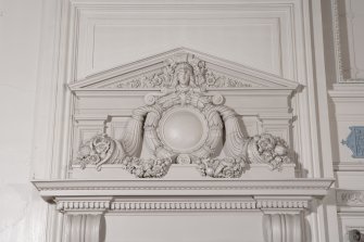 Interior. Auditorium, balcony, detail of overdoor pediment.