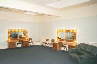 Interior. 1st floor.  Dressing room 4 from north west with make-up mirror lights on.