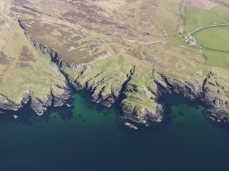 General oblique aerial view of fort at Dun Bheolain, Islay, taken from the WNW.