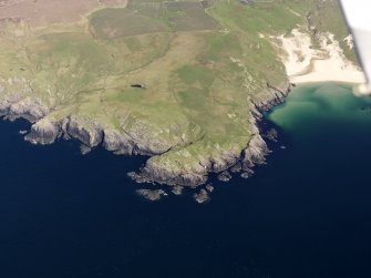General oblique aerial view of fort at Dun Na Faing, Lossit Point, Islay, taken from the WSW.