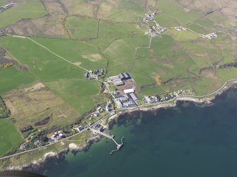 General oblique aerial view of Bruichladdich, Islay, taken from the SE.