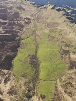General oblique aerial view of the remains of the field systems and farmsteads at Sruthan Poll Nan Gamhna, Islay, taken from the ESE.