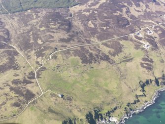 General oblique aerial view of the remains of the farmsteads, field boundaries and rig at Lurabus, Islay, taken from the SE.