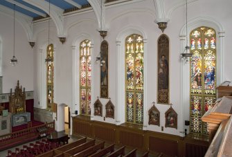 Interior. West wall from balcony to north east.