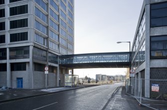 View taken from the NE, looking along Dock Street to the footbridge linking the tower and reception building of Tayside House