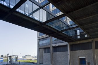 View of the exterior of Tayside House at street level, including the underside of the footbridge link between tower and reception