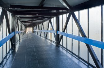 View from SSE, looking along the interior of the footbridge linking the Olympia Centre with Tayside House