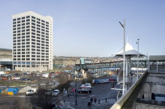 View looking N along the elevated platform of the Olympia Centre to Tayside House and the footbridge linking the two