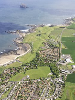 General oblique aerial view of North Berwick Golf Courses centred on Glen Golf Course with the Bass Rock in the background, taken from the SW.