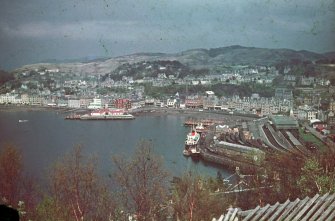 Oban Bay from Pulpit Hill, showing ferries and railway station.