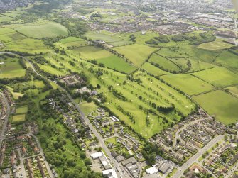 Oblique aerial view of Clydebank and District Golf Course, taken from the NW.