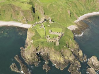 Oblique aerial view of Dunnottar Castle, taken from the ESE.