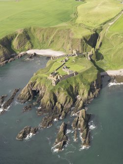 General oblique aerial view of Dunnottar Castle, taken from the ENE.