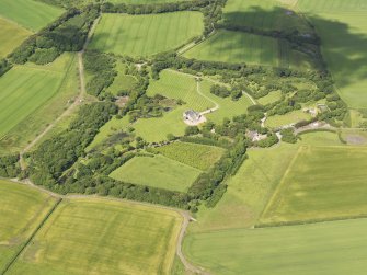 General oblique aerial view of Menie House and policies, taken from the E.