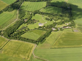 General oblique aerial view of Menie House and policies, taken from the E.