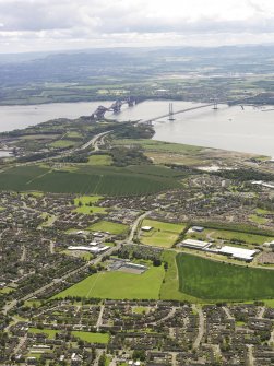 General oblique aerial view of Rosyth, Forth Rail Bridge and Forth Road Bridge, taken from the NW.