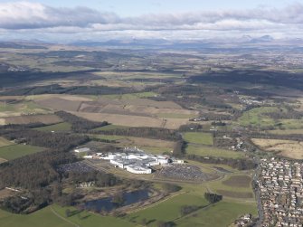 General oblique aerial view of the Upper Forth Valley with the Forth Valley Hospital at Larbert in the foreground, taken from the SSE.
