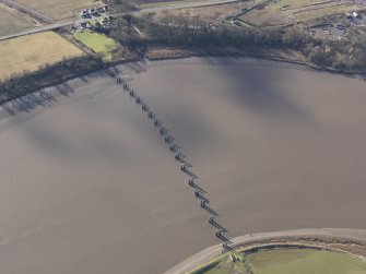 Oblique aerial view of the piers of the old Forth Rail Bridge at Alloa, taken from the NE.