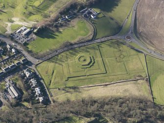 Oblique aerial view centred on the earthworks of the King's Knot garden below Stirling Castle, taken from the NE.