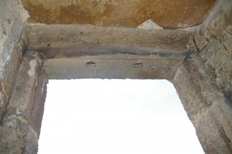Window detail showing holes for bars in Room 4, Fourth Floor, View from West