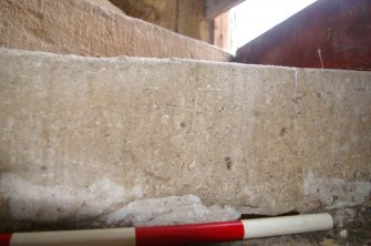 Masons Mark on stair outside Room 3,  Third Floor, View from East