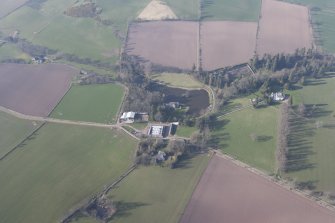 Oblique aerial view centred on Ecclesmagirdle House, looking NNW.