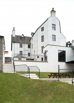 View of the rear of the east hotel building, with 4-storey north jamb,  taken from north east